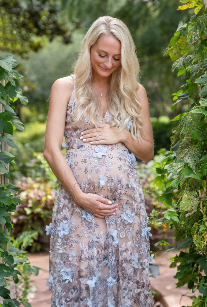Maternity photoshoots and pregnancy announcement with blonde women in a cute dress